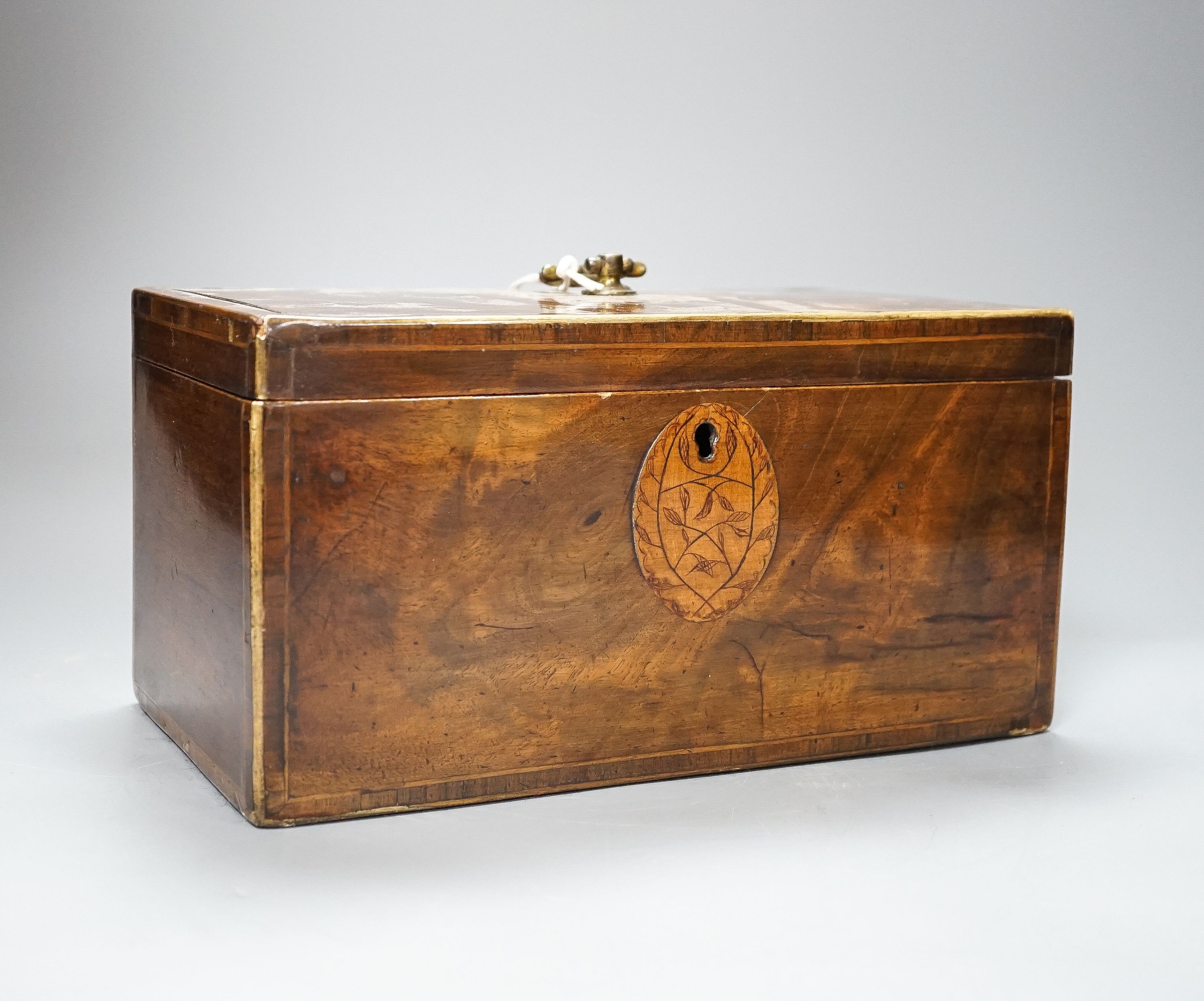 A George III inlaid mahogany tea caddy, lacking interior, 28cm